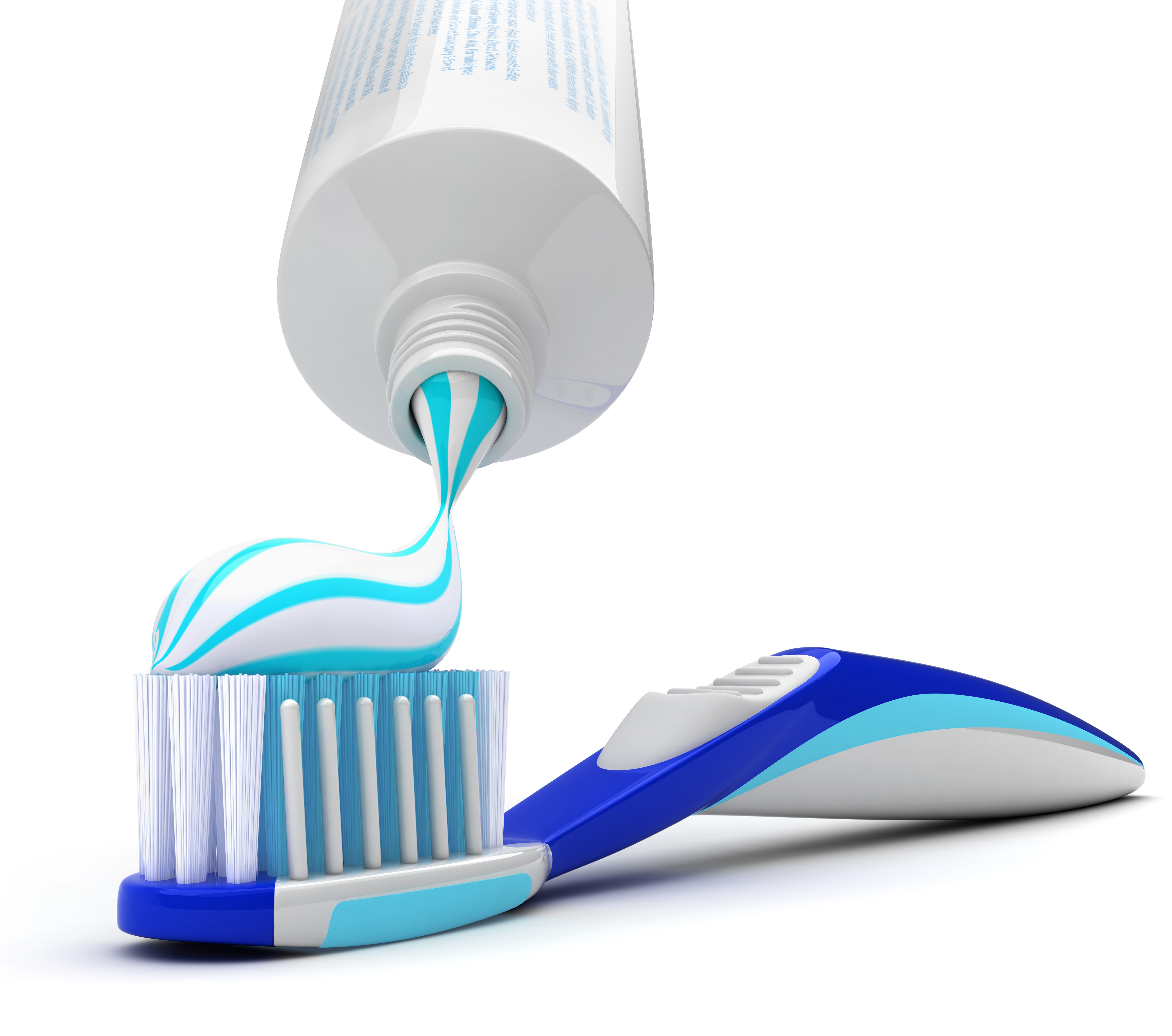 Squeezing toothpaste onto toothbrush ABQ Dental Associates